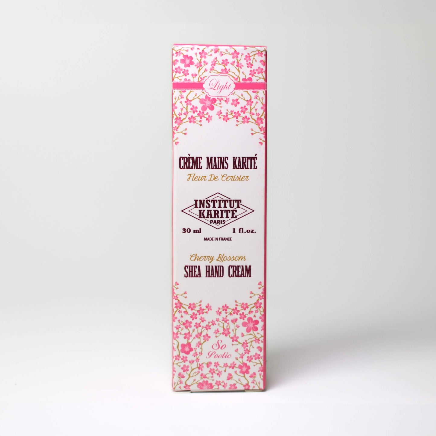 Packaging of 30mL Cherry Blossom Shea Light Hand Cream by Institut Karité Paris