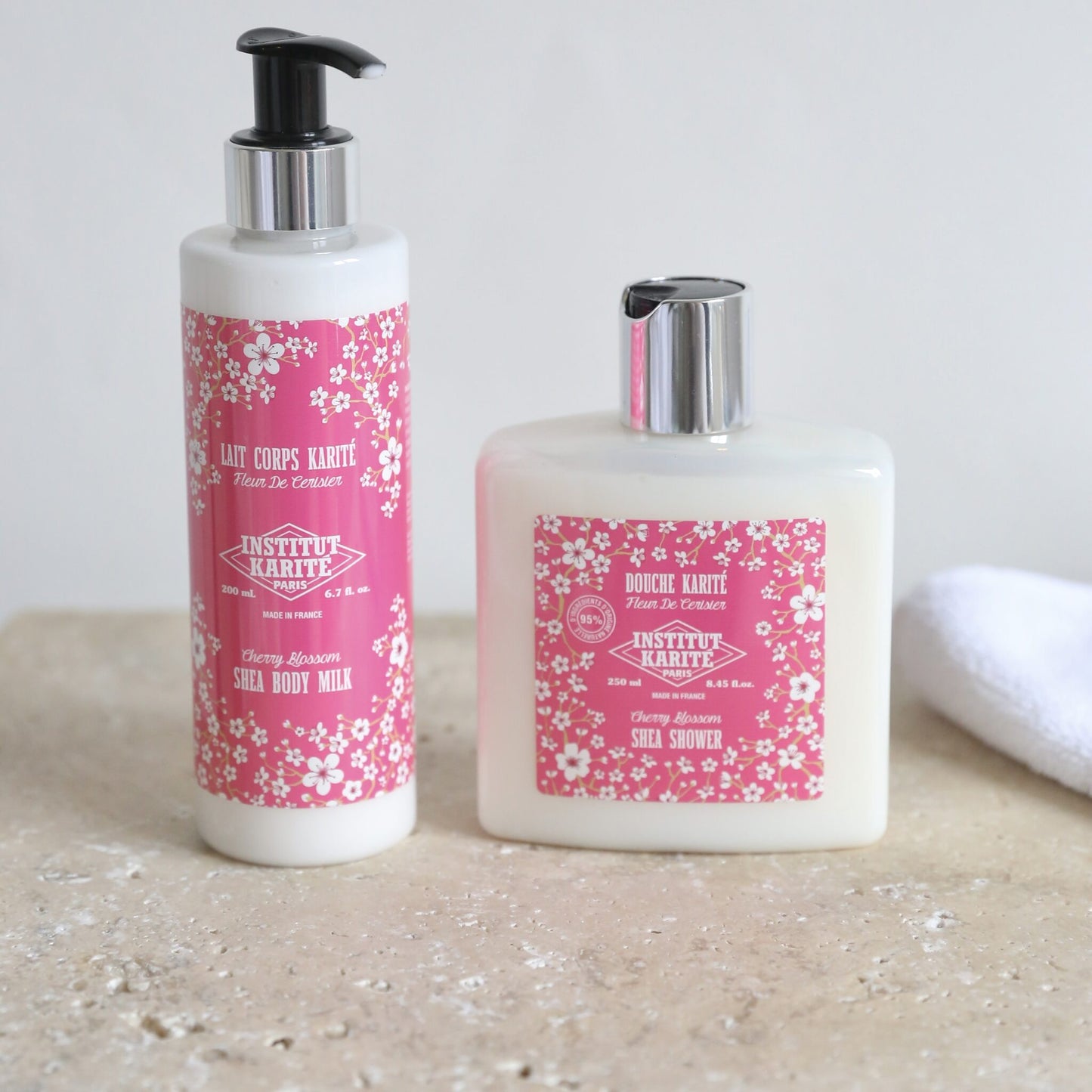 200mL Cherry Blossom Shea Body Milk beside the matching Cherry Blossom Shea Shower gel by Institut Karité Paris