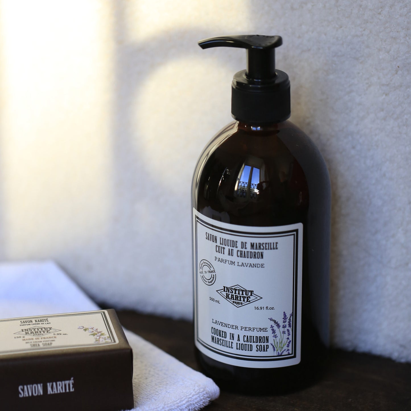 Lavender Marseille Liquid Soap 500ml beside a boxed Shea Soap bar