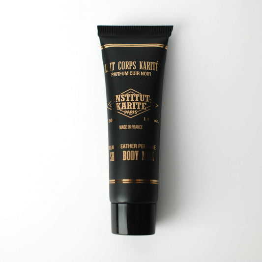 Front view of 30mL Black Leather Shea Body Milk by Institut Karité Paris