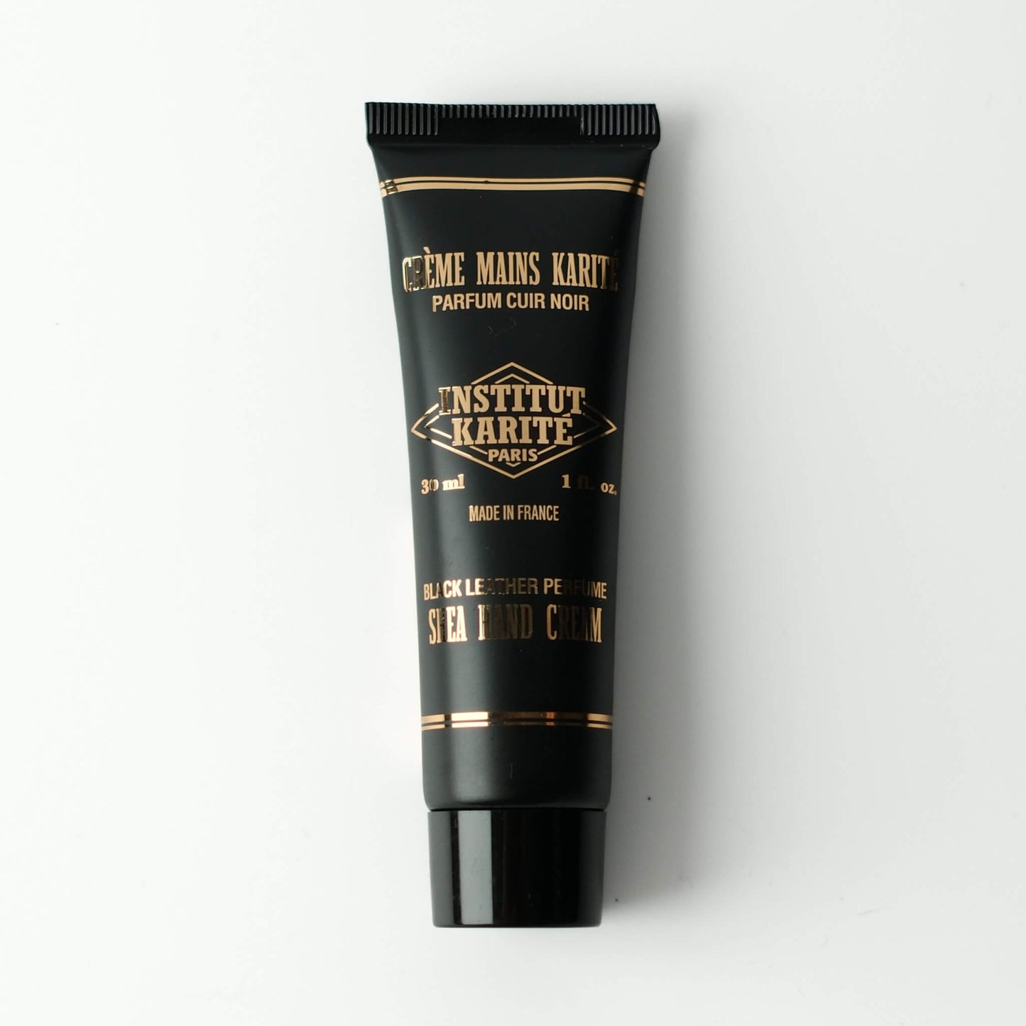 Front view of 30mL Black Leather Shea Hand Cream by Institut Karité Paris