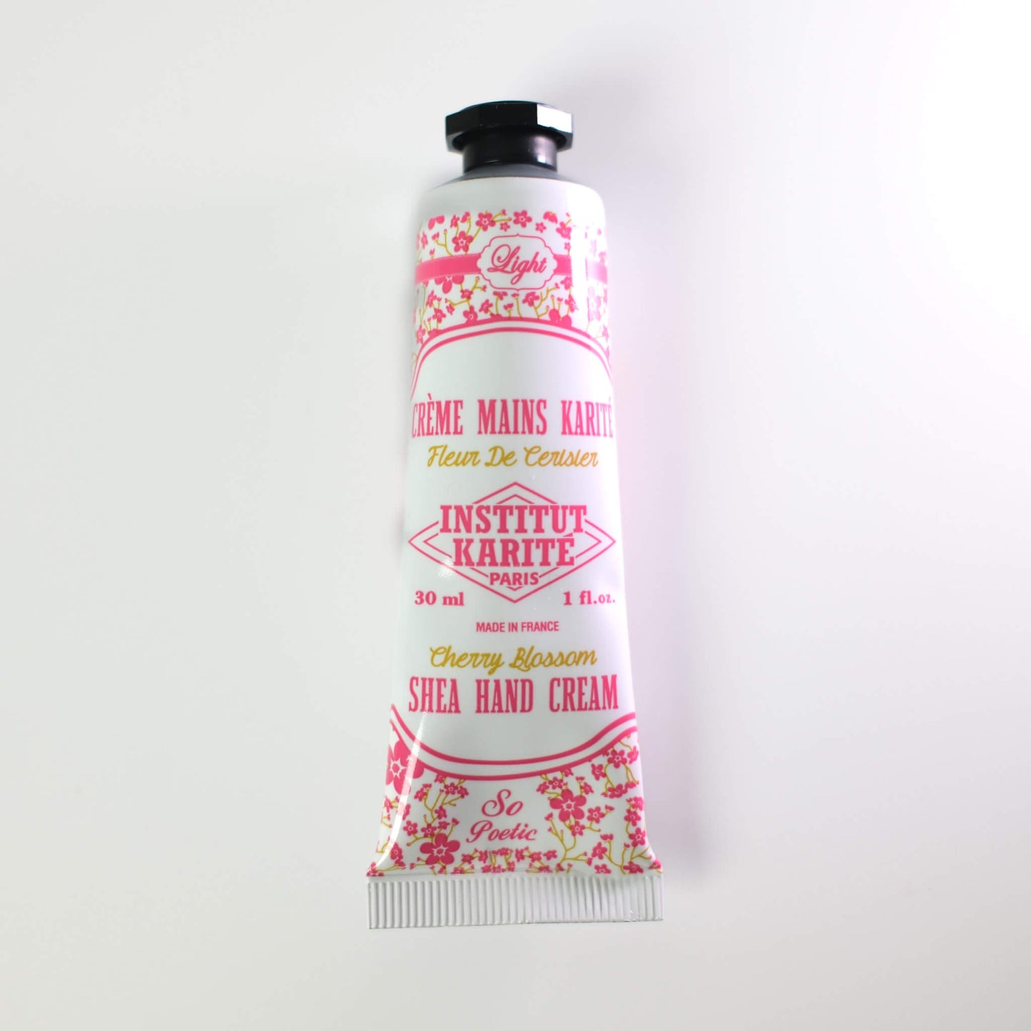 Front view of 30mL Cherry Blossom Shea Light Hand Cream by Institut Karité Paris