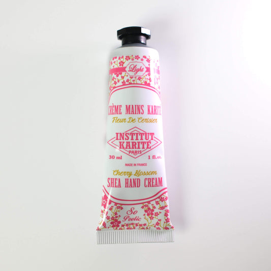 Front view of 30mL Cherry Blossom Shea Light Hand Cream by Institut Karité Paris