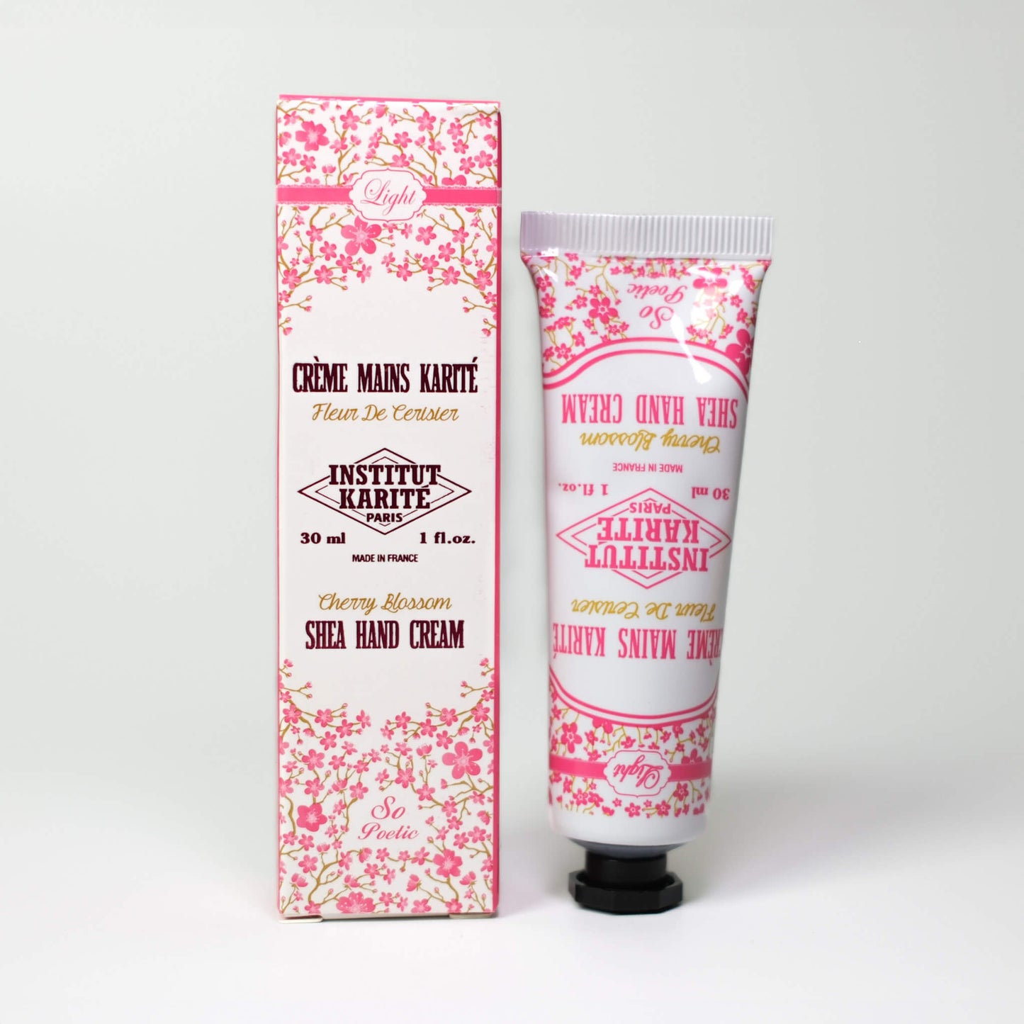 Front view of 30mL Cherry Blossom Shea Light Hand Cream with Packaging by Institut Karité Paris