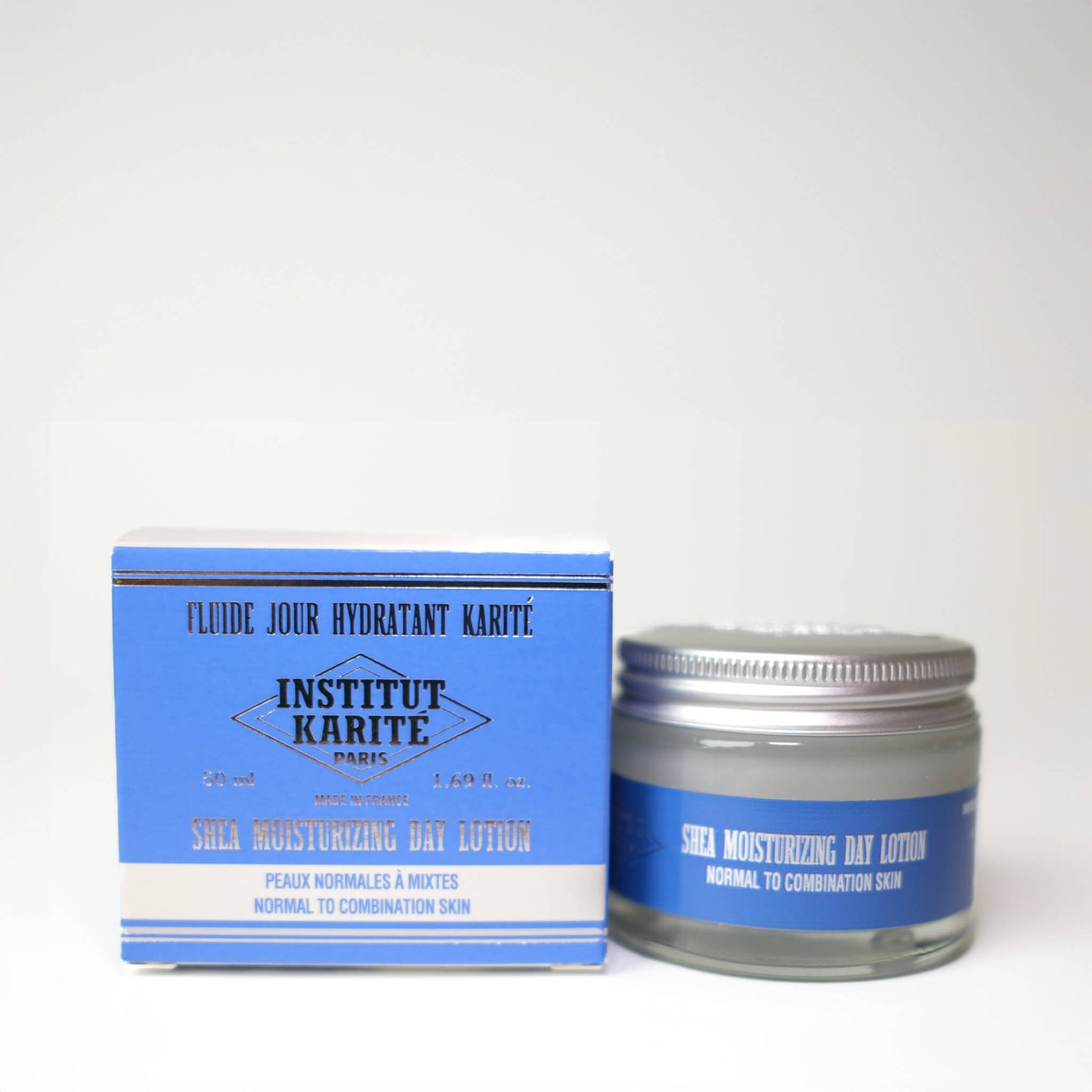 Front view with English of 50mL Shea Moisturising Day Lotion with packaging by Institut Karité Paris