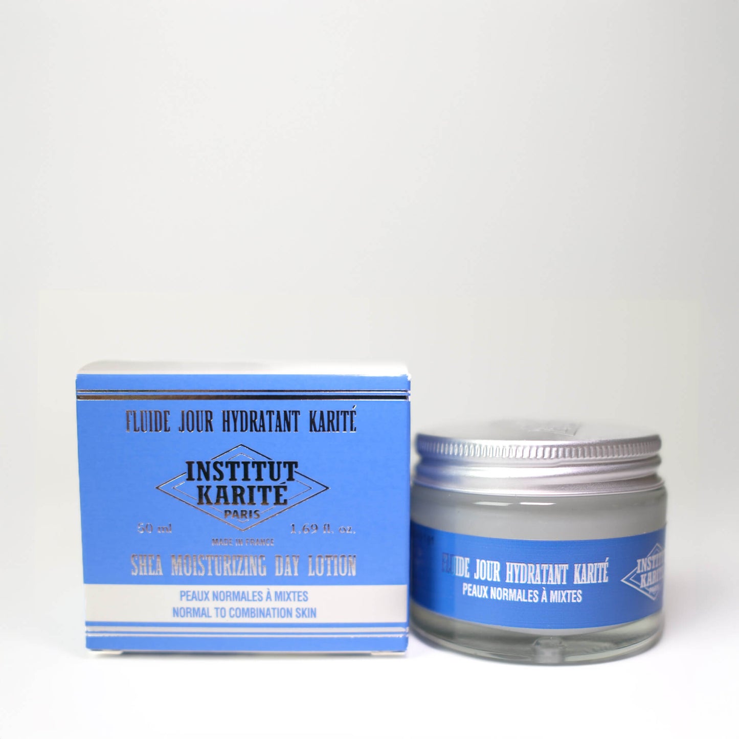 Front view with French of 50mL Shea Moisturising Day Lotion with packaging by Institut Karité Paris