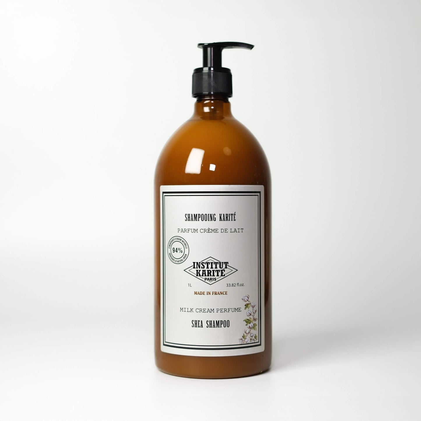 Front view of 1L Milk Cream Shea Shampoo bottle by Institut Karité Paris
