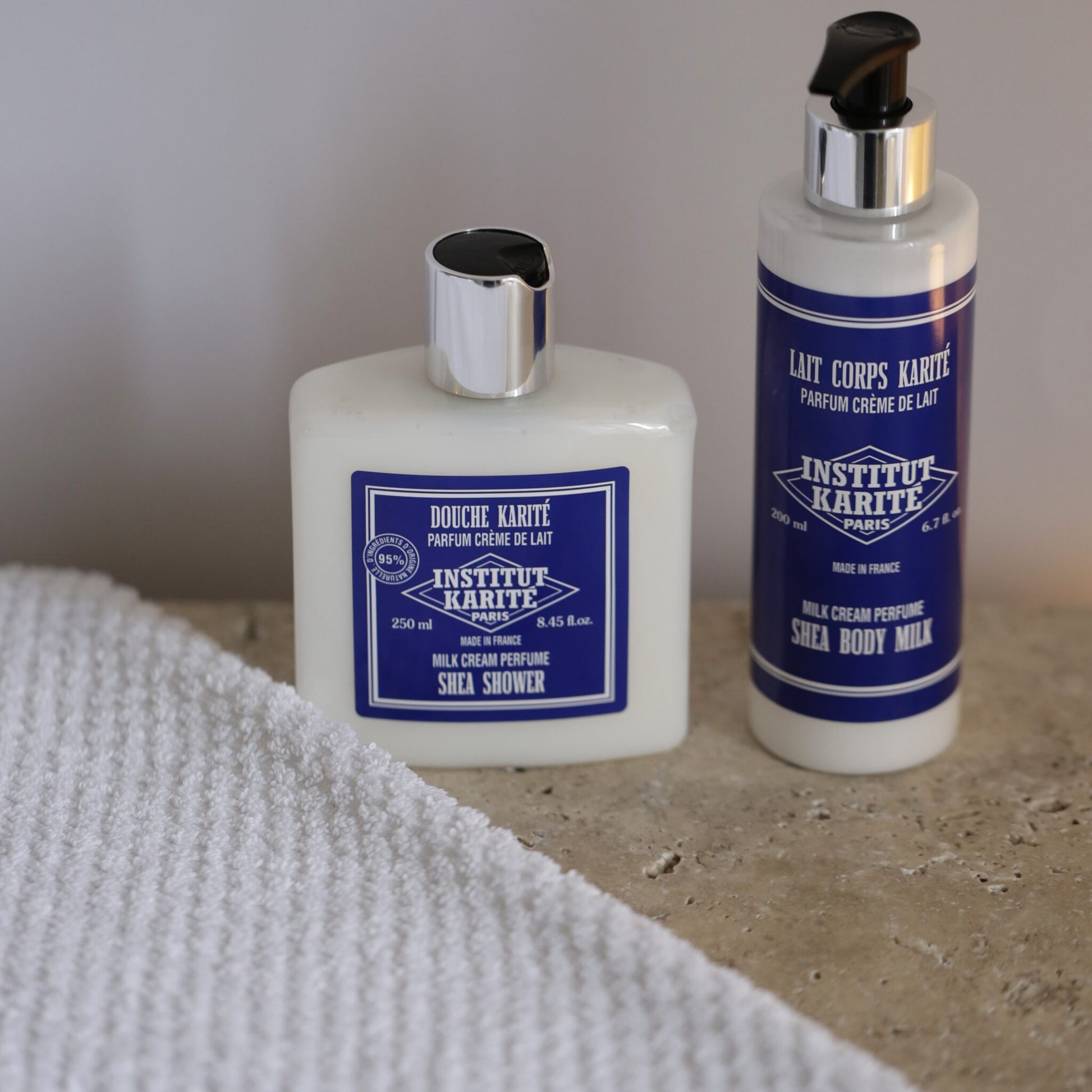 200mL Milk Cream Shea Body Milk beside the matching Milk Cream Shea Shower gel by Institut Karité Paris